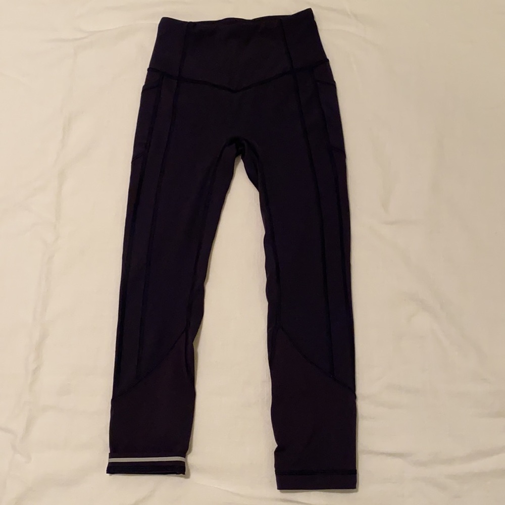 Purple Highwaisted Lululemon Leggings with Reflective Accent